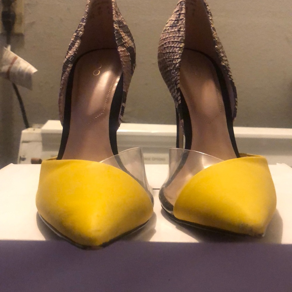 Yellow two torn snake heels worn once